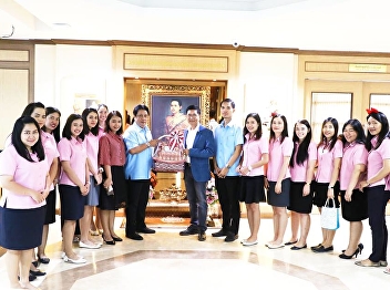 Executive Committee the Office of
academic education by Professor Dr.
Preechaa Pongpeng. Director, Office of
personnel Giving a basket  Happy New
Year 2019, the administrators of Suan
Sunandha Rajabhat University.